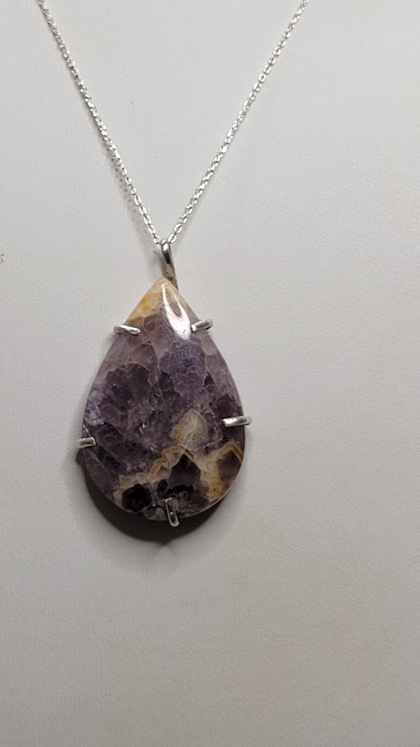 Raw amethyst pendant